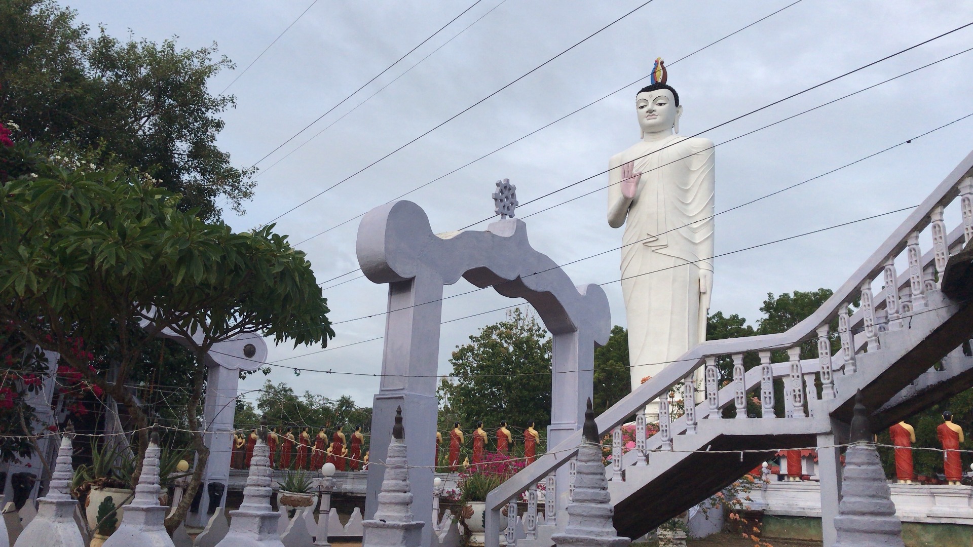 Buddha Statue In Front Of Hostel